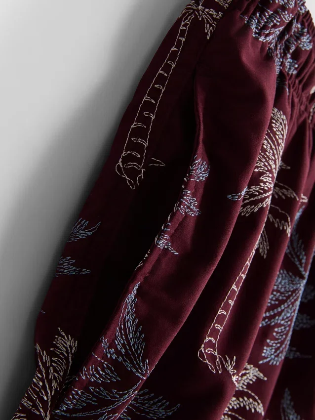 Zwemshort met geborduurde palmboom